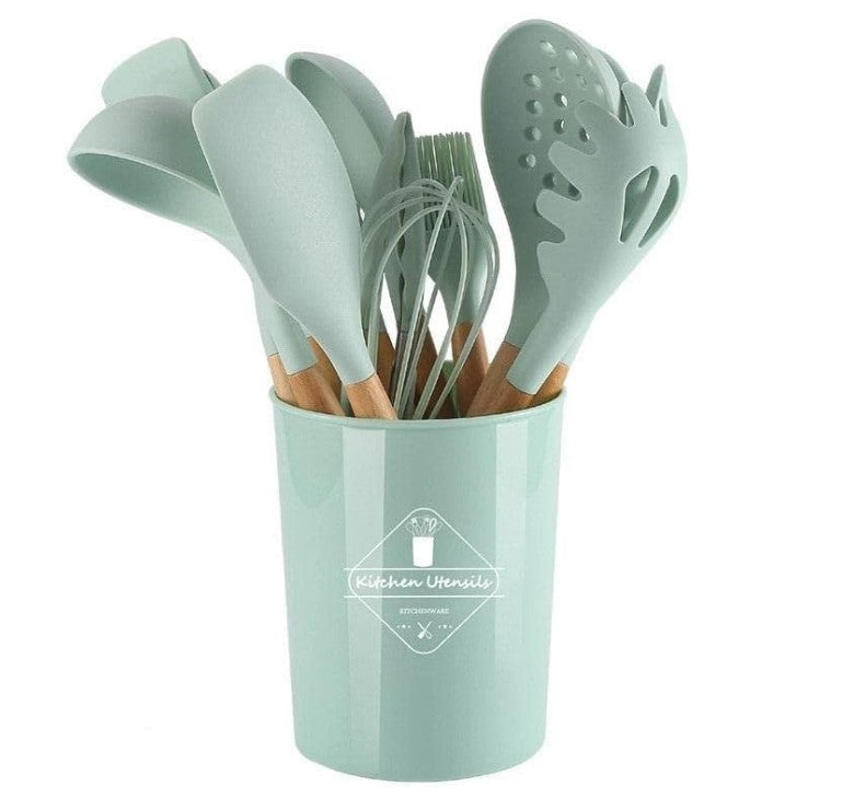 A silicone kitchen utensil set 12pcs with light wood handles and mint green heads, mint green storage case