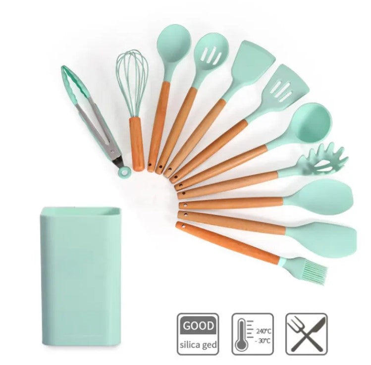 A silicone kitchen utensil set 12pcs with light wood handles and mint green heads, mint green storage case