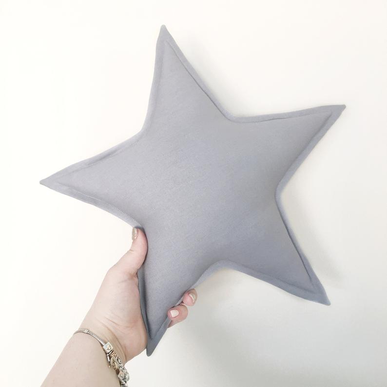 Star shape cushion filled with hollow fibre deco and kid play
