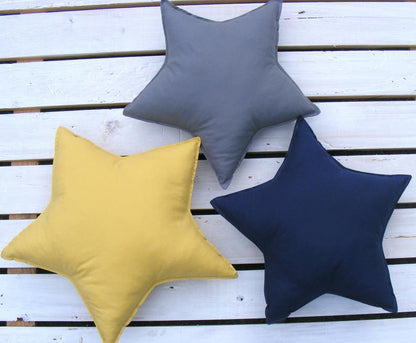 Star shape cushion filled with hollow fibre deco and kid play